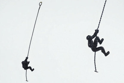 Decoracion colgante de escalador