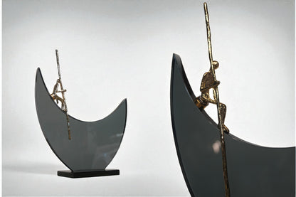 Pescador en luna de vidrio